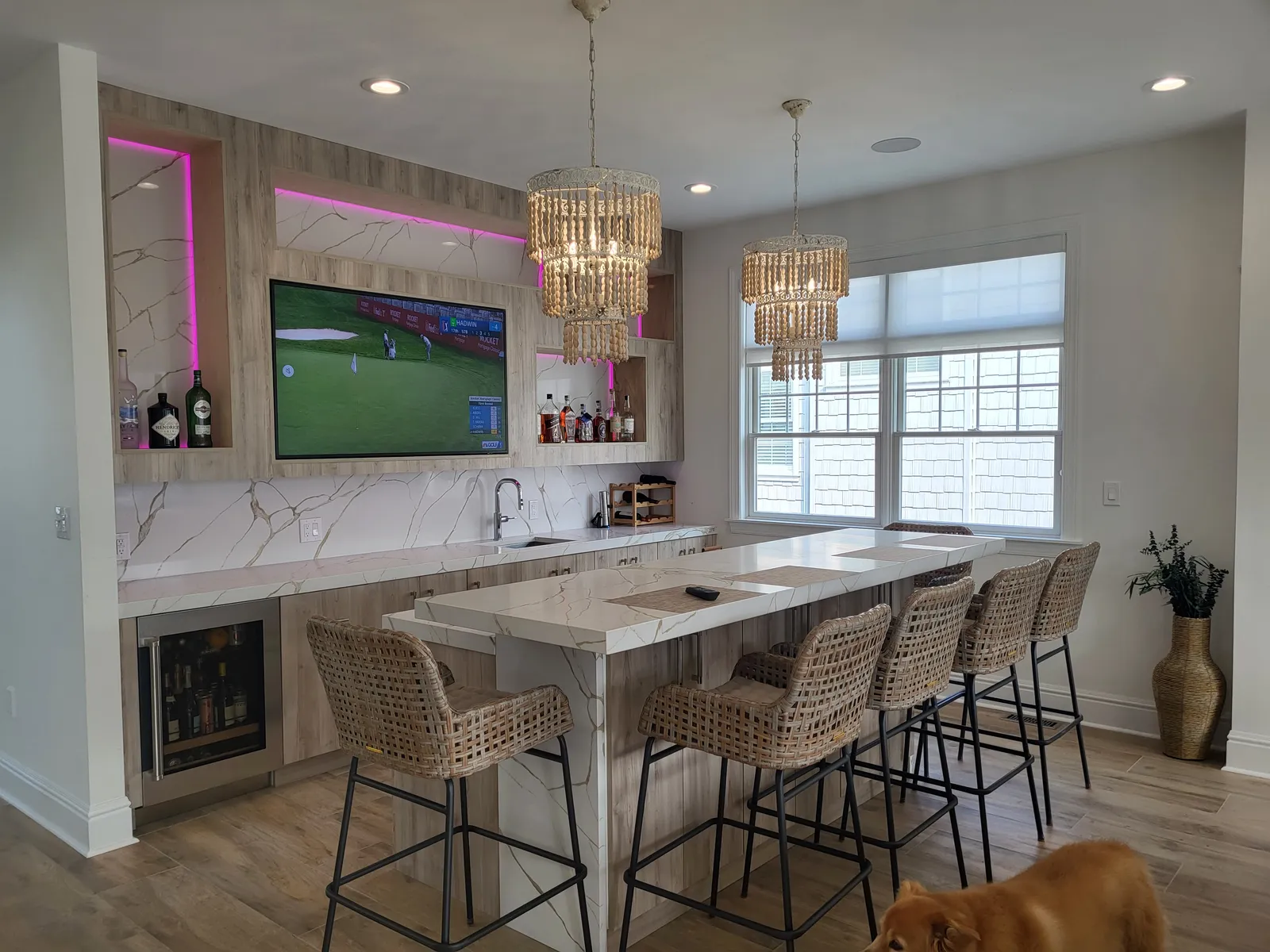 Bar seating and media wall in the same home