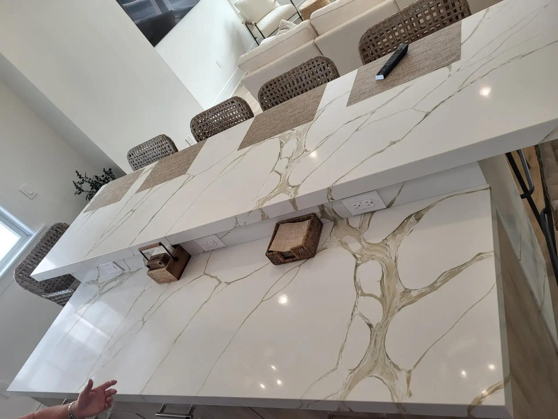 Waterfall edge where the countertop turns down the side of the island