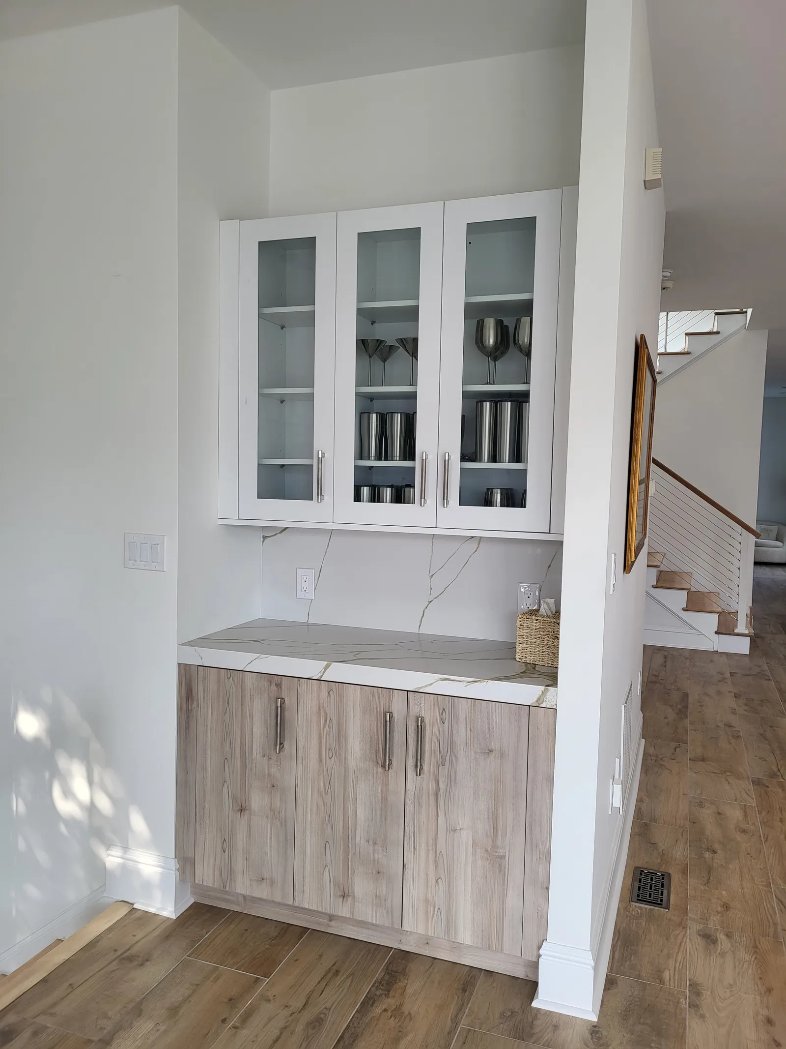 Glass front hutch and dry bar in the same home