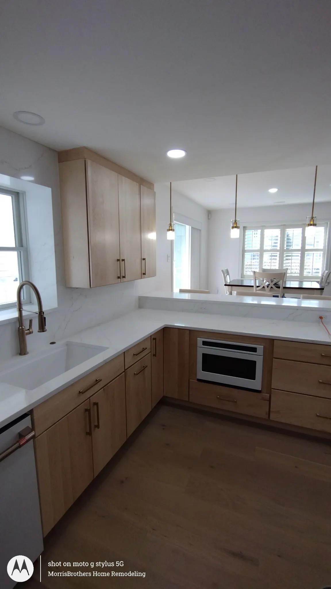 Natural wood cabinetry in a new construction kitchen