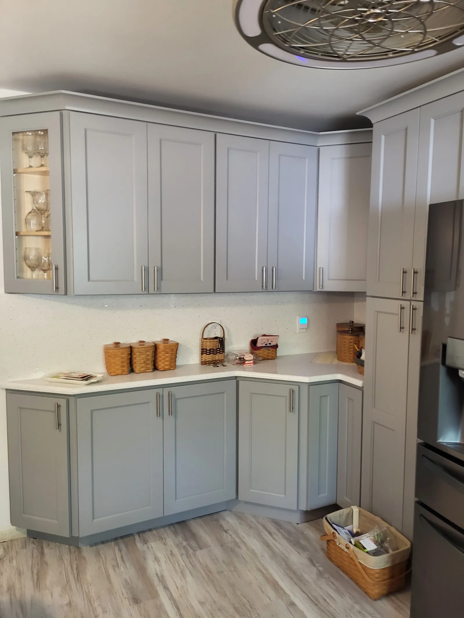 Another angle of the sage grey kitchen
