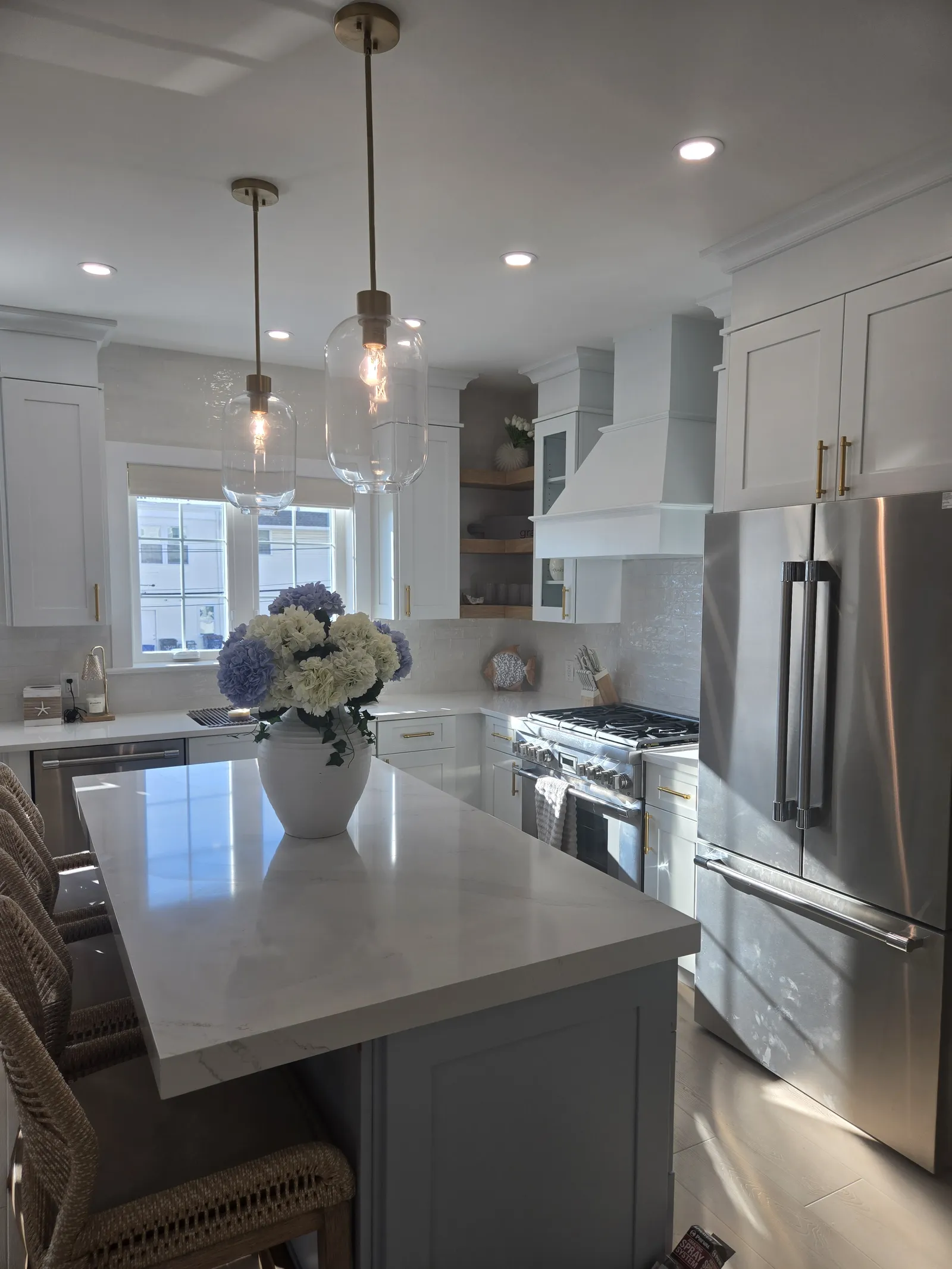 White kitchen and hood in the same home
