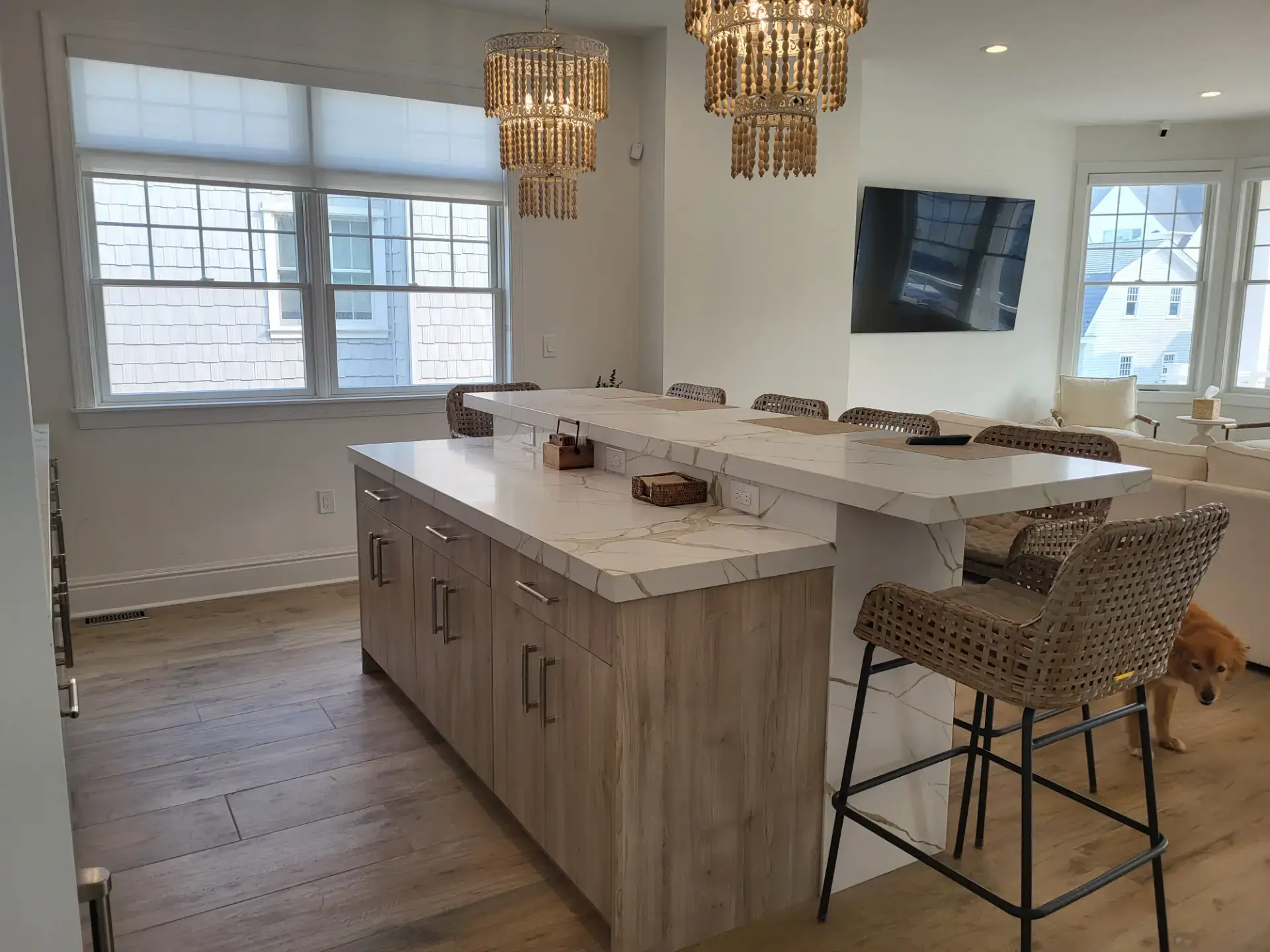 Wood island with pendant lighting above