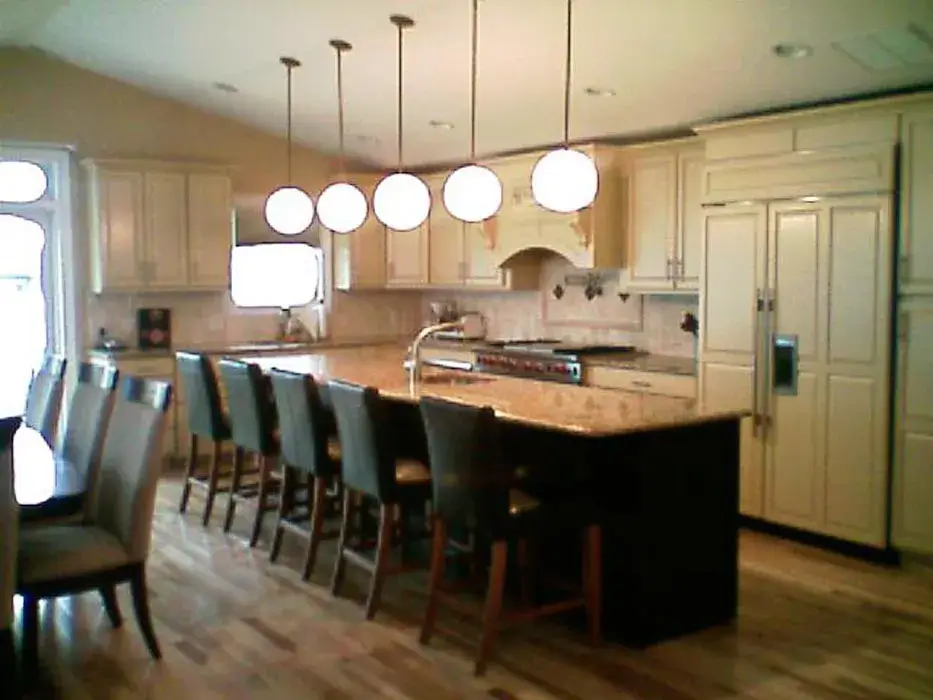 Wood kitchen with a long island and counter seating