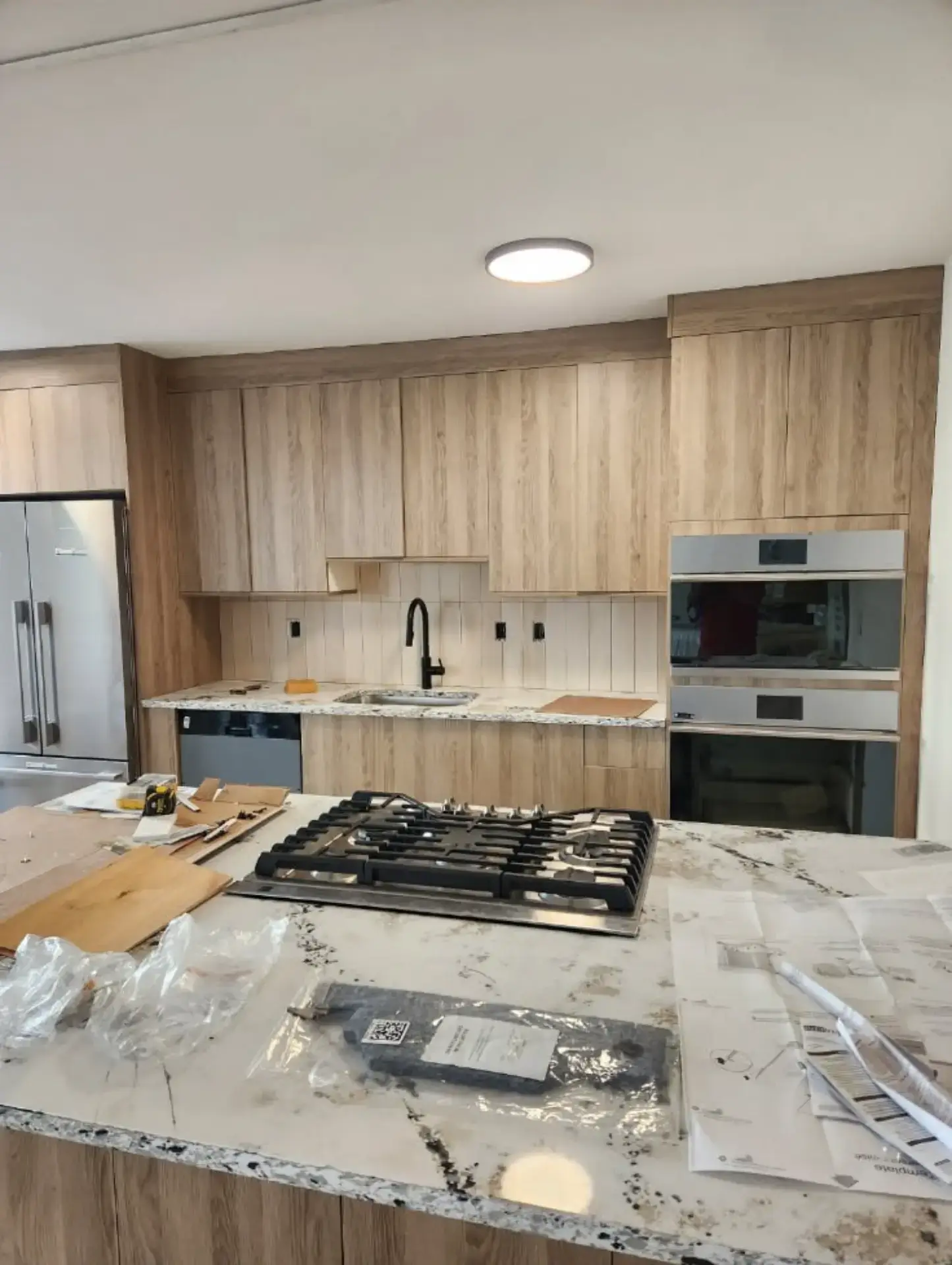 Modern wood kitchen with a built in cooktop