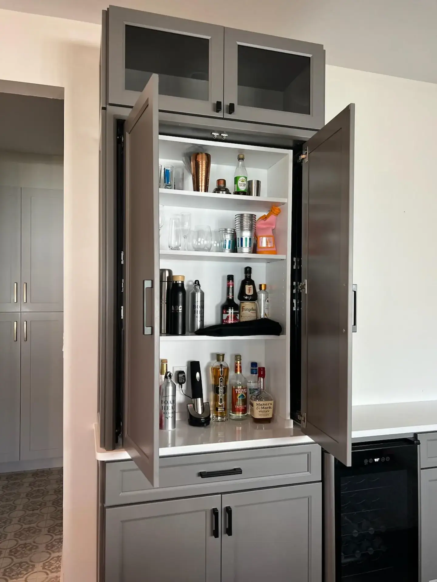 The same larder open, with interior shelving